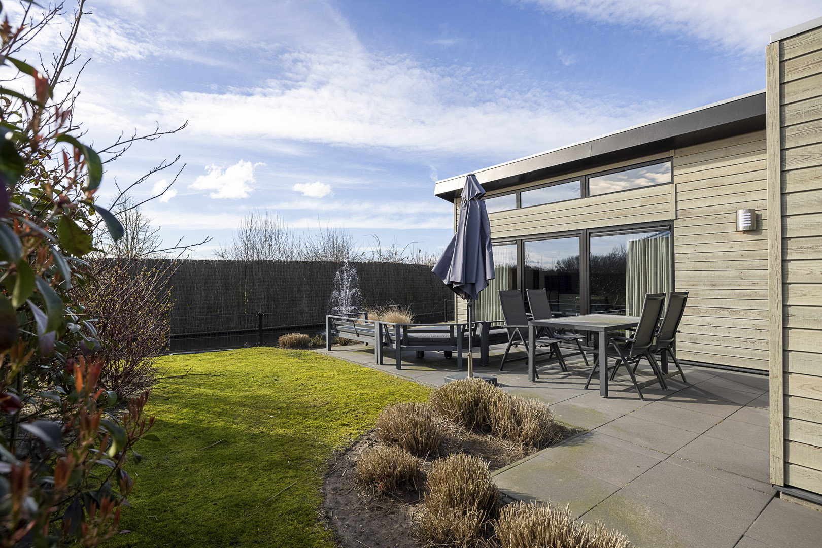 Watervilla op park Familiehuis Nunspeet aan een vijver